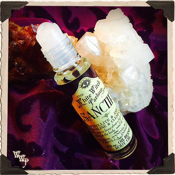 SANCTIFY Elixir 1/3oz. Body Oil Rollon. Scent of Vanilla, Sandalwood, Jasmine & Amber. Blessed by Apophyllite, Ametrine, Tourmaline & Clear Quartz Crystals.