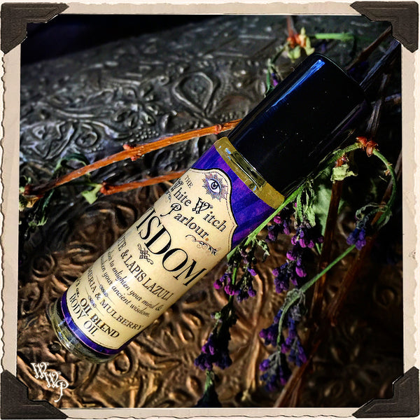 WISDOM Elixir 1/3oz. Body Oil Rollon. Plumeria & Mulberry Blessed with Iolite & Lapis Lazuli Crystals.